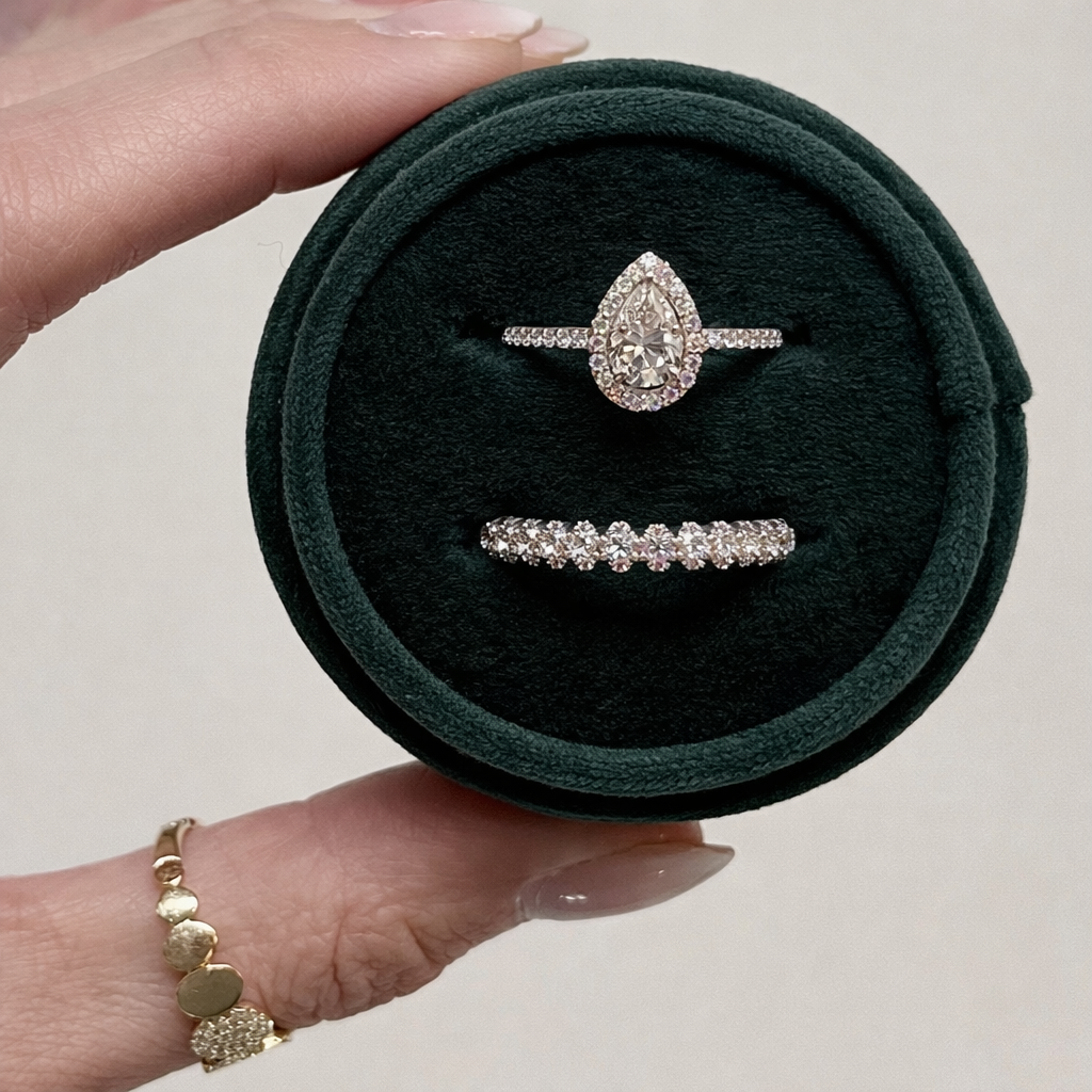 14kw diamond pear shape ring.