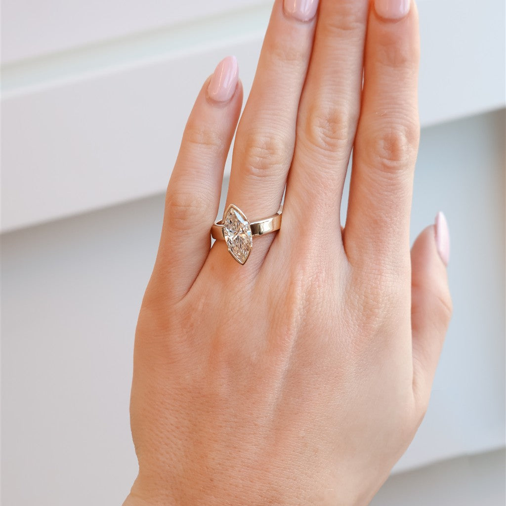 14kt yellow gold 3.04ct MQ lab