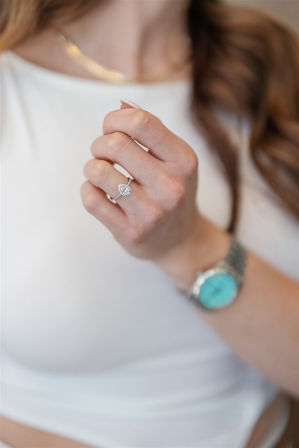 14kw diamond pear shape ring.