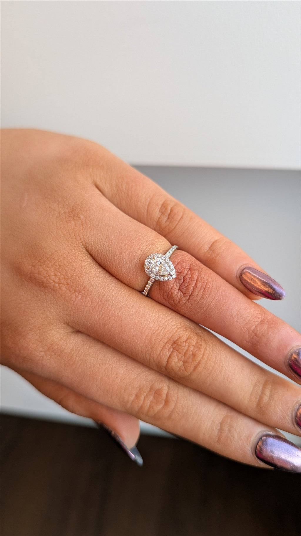 14kw diamond pear shape ring.