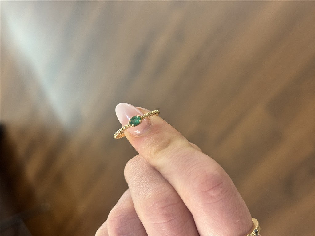 14ktYG Ring with 0.15ct oval E