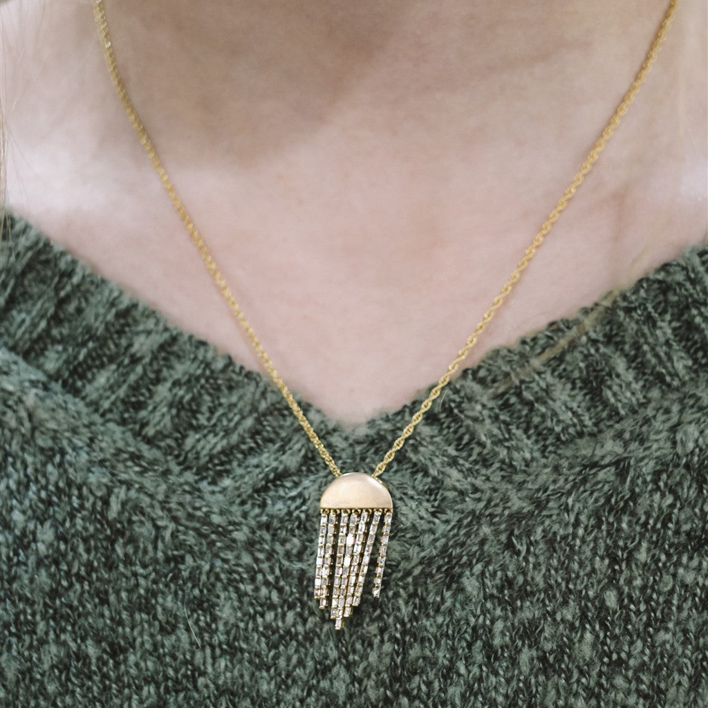 14k yg .38tw baguette 1/2 moon
