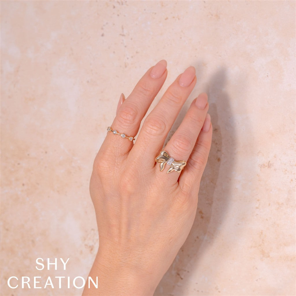 14KY 0.09CTW DIAMOND BOW RING