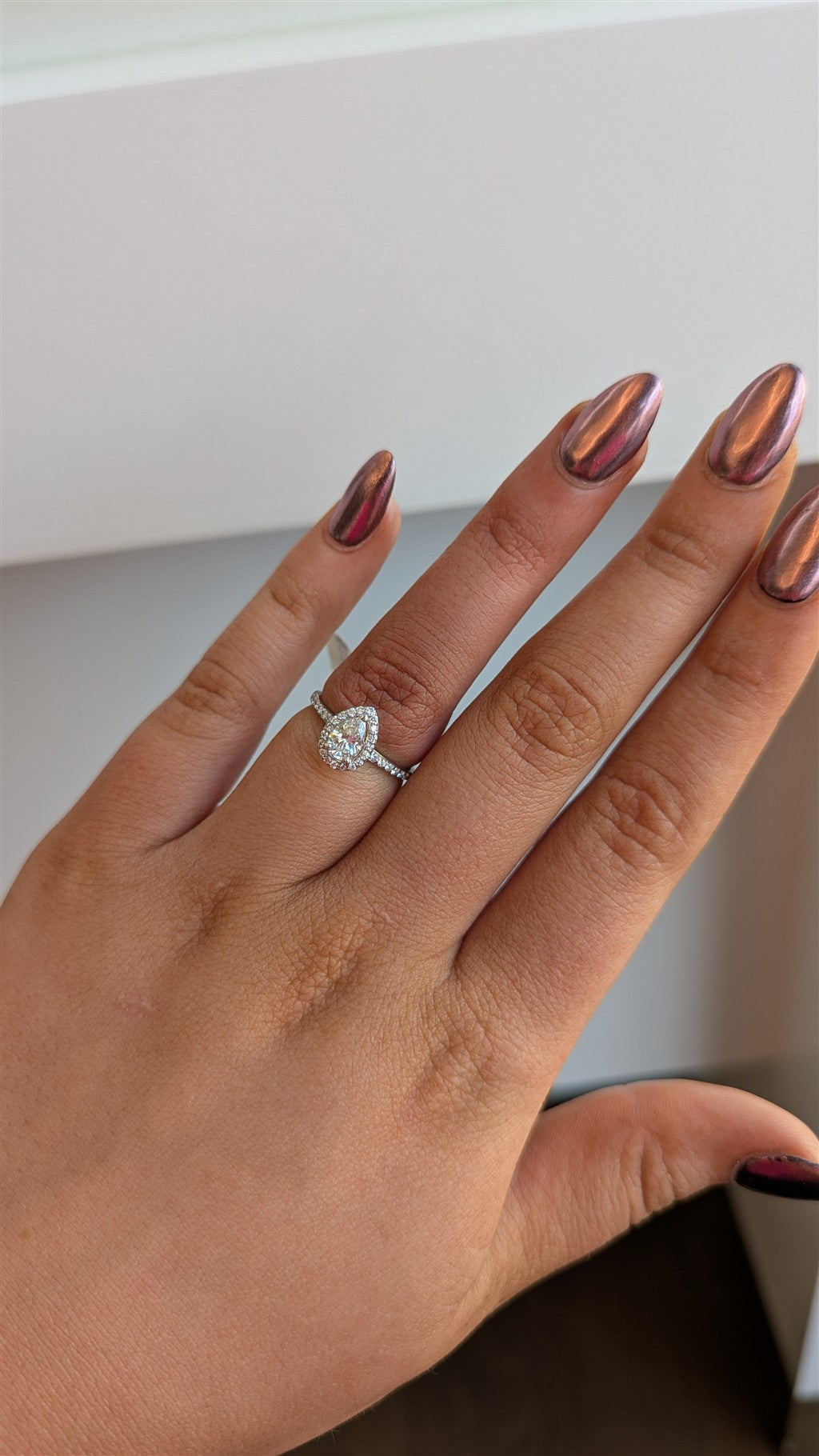 14kw diamond pear shape ring.