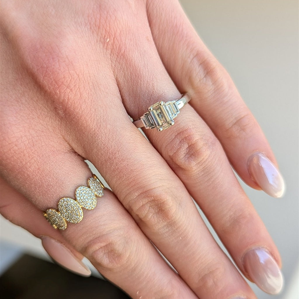 14k wg emerald cut three stone