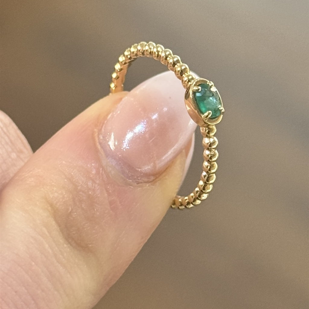 14ktYG Ring with 0.15ct oval E