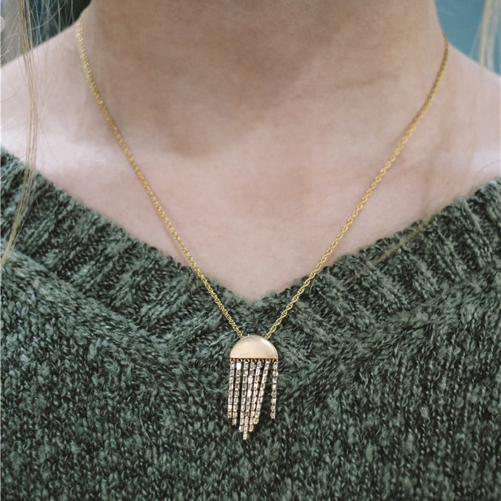 14k yg .38tw baguette 1/2 moon