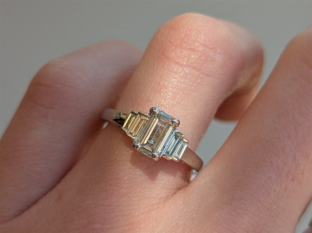 14k wg emerald cut three stone