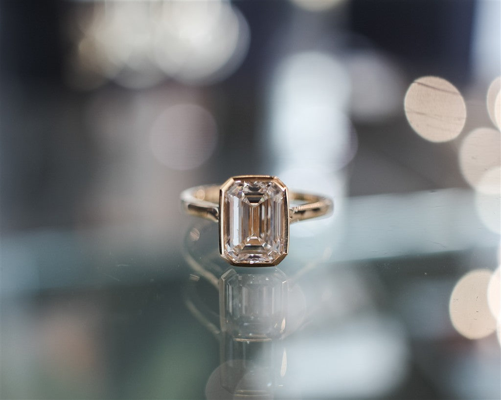 14k yg 3.00 ct emerald cut lab