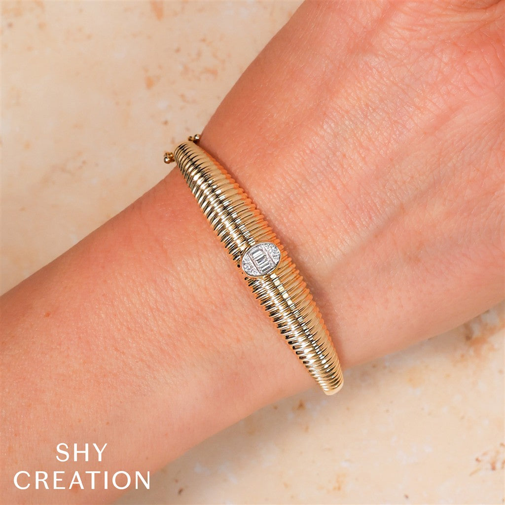 0.28CT 14K2T Y/W DIAMOND BAGUE